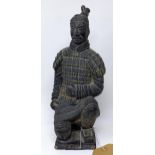 A Chinese terracotta statue of a warrior, H.30cm