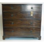 A 19th century mahogany chest of two short over three long drawers, raised on bracket feet, H.101