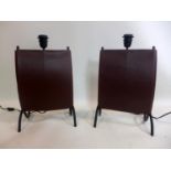 A pair of leather and black steel bookend lamps, H.48cm