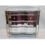 A contemporary mirror chest of three drawers, some cracks, H.88 W.97 D.46cm