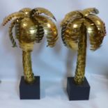 A pair of Maison Jansen style gilt sheet metal palm trees, H.110cm