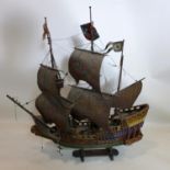 An early 20th century painted wooden model of a galleon, H.69 W.65cm