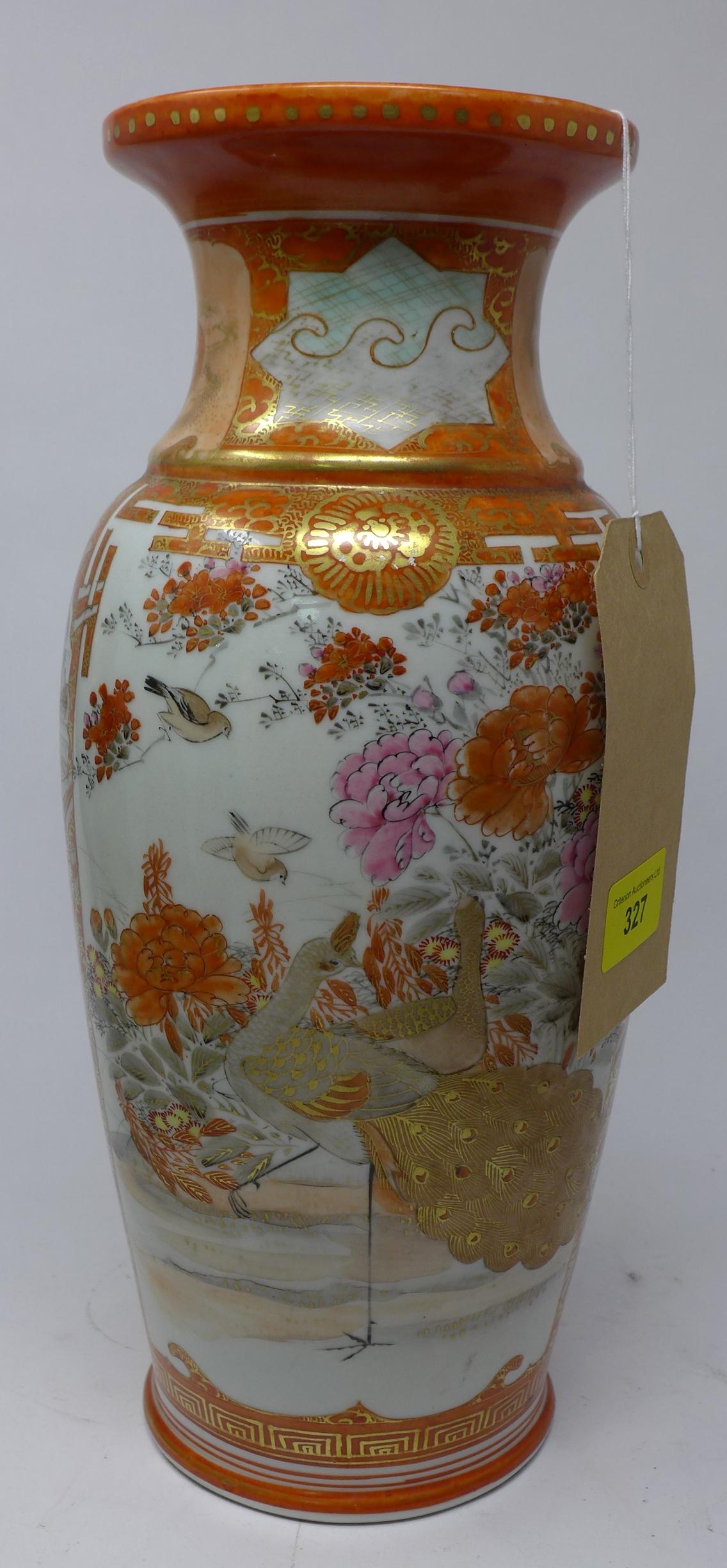 A late 19th century Japanese porcelain vase, cracked, H.34cm