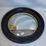A contemporary circular convex mirror, with black frame and gilt painted border, Diameter 74cm