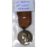 WITHDRAWN-An 1815 Waterloo Wellington medal with ribbon inscribed 'W.M Brown, 11th Light Dragoons'