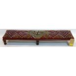 A Victorian mahogany foot stool with beaded tapestry upholstery, H.18 W.106 D.24cm