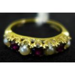 A 9ct gold ring set with rubies and pearls