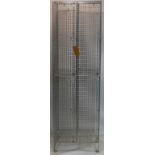 A steel cage locker, H.197 W.60 D.31cm