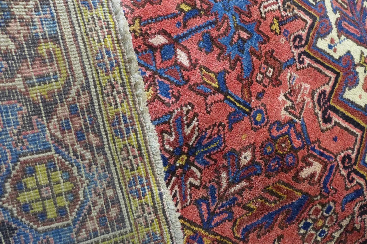 A North West Persian Heriz carpet, central diamond medallion with repeating petal motifs on a - Bild 2 aus 2