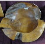 A large rustic wooden fruit bowl, H.17 W.51 D.51cm