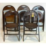 A set of five vintage folding oak bistro chairs