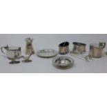 A collection of silver, to include a silver coin dish, Nat Leslie Ltd, London 1973, a dish with
