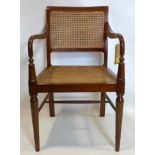 A 19th century mahogany desk chair, with double cane back rest and single cane seat