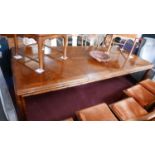 A Chinese style hardwood dining table, with two extra leaves, by Century Furniture of Distinction,