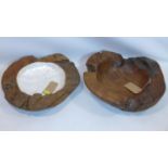 A large rustic wooden fruit bowl, with mother of pearl inlaid interior, H.13 W.51 D.47cm