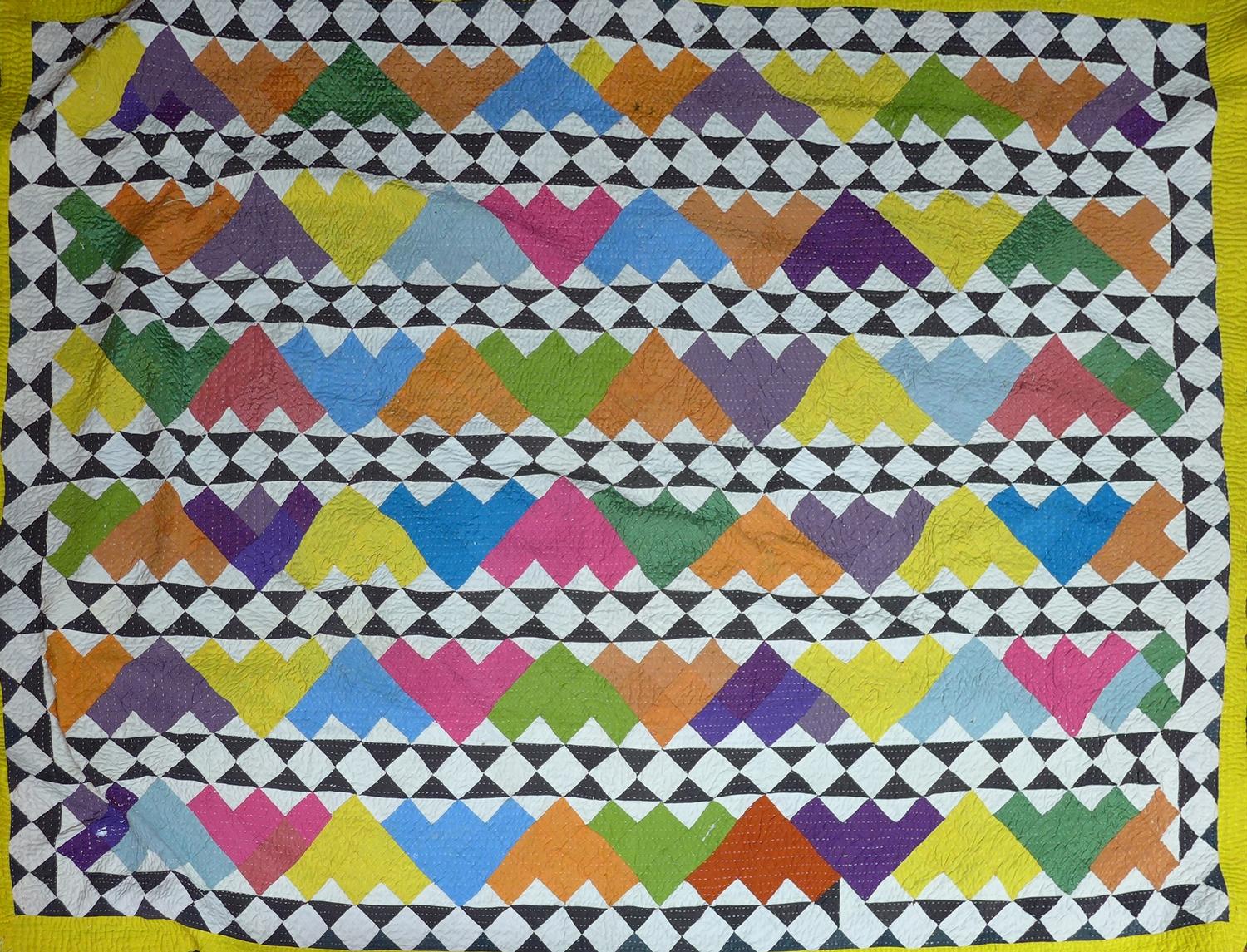 A handmade double, multi-coloured cotton patchwork quilt from Gujarat, mid 20th century 220 x 160cm