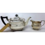 A silver teapot and milk jug, by William Hutton & Sons Ltd, Sheffield 1937-8, with gadrooned rims on