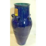 A Persian blue glazed Sharab wine vessel, H.89cm