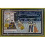 A framed, 19th century Indian painting depicting a wedding scene on a terrace within landscaped
