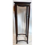 A 19th century Chinese hardwood jardiniere stand, H.104 W.33 D.33cm