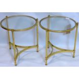 A pair of contemporary circular gilt metal occasional tables, with glass tops, H.45cm Diameter