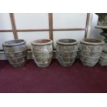 Four small Atlantis style planters, H.37cm Diameter 31cm (4)