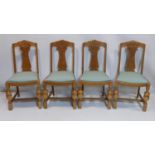 A set of four Art Deco oak chairs