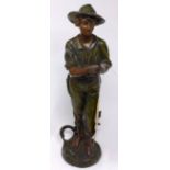 An early 20th century painted bronze figure of a boy, H.41cm