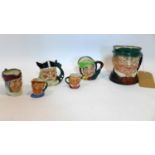 A collection of ceramics to include five Royal Doulton character jugs, a Nao figurine, a Lladro