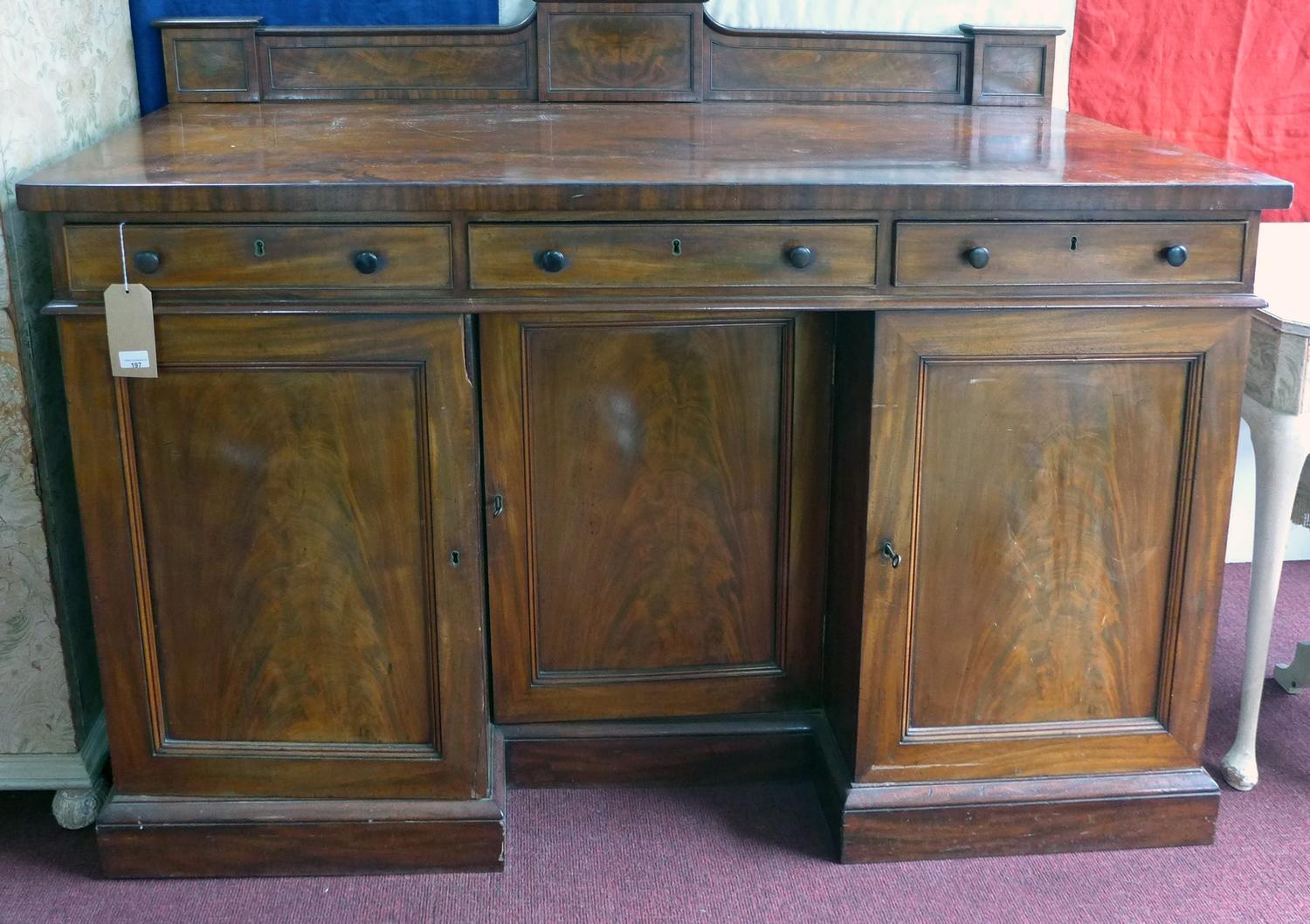 A 19th century Gillows of Lancaster mahogany sideboard, three drawers over three cupboard doors,