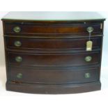 A Duncan Phyfe mahogany bow front chest of drawers with brush slide, H.91 W.112 D.51cm