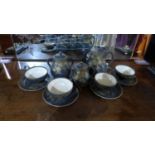 A hand painted Japanese satsuma tea set for four