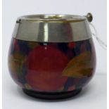 A Moorcroft Burslem pot with silver plated top