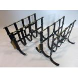 A pair of vintage wrought iron magazine racks