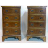 A pair of Georgian style yew wood and walnut side chests of four drawers, H.74 W.45 D.33cm