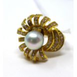 An 18ct yellow gold diamond and grey South Sea Pearl cocktail ring, Size: L, 7g