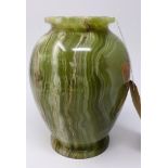 A green onyx vase, on circular base, H.21cm