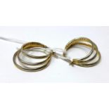 A pair of 9ct yellow gold and white gold diamond studded 3-row hoop earrings, L: 2.5cm, 7g.