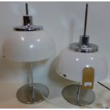 A pair of Harvey Guzzini adjustable table lamps with makers stickers