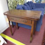 A 19th century mahogany drop leaf table, (hinge for top broken), having single drawer, on