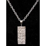 A 14ct white gold and brilliant-cut diamond pave-set rectangular pendant on 14ct white gold chain