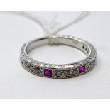 An 18ct white gold diamond and ruby ring, channel set with 3 natural square shaped rubies and 12