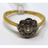 An 18ct yellow gold and platinum diamond flower-head cluster ring, Size: K 1/2, 1.8g