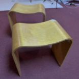 A pair of Heals bent wood stools