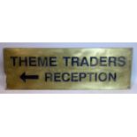 A brass sign - Theme Traders - Reception, 25 x 75cm