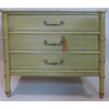 A 20th century cream painted faux bamboo chest of drawers, with formica top, H.76 W.78 D.50cm