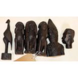 A collection of African tribal ebonised carvings, to include the three wise monkeys, H.17cm (