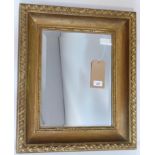 A giltwood mirror with bevelled plate, 59 x 50cm