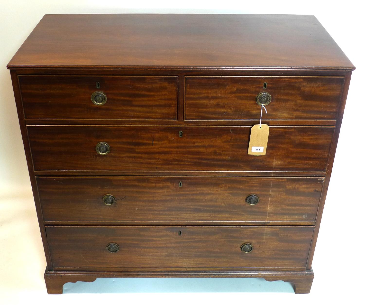 A 19th century mahogany chest of two short over three long drawers, raised on bracket feet, H.101 - Image 2 of 2