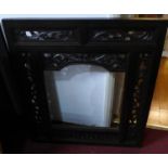 A late 19th/early 20th century Indian carved hardwood window frame, 90 x 79cm